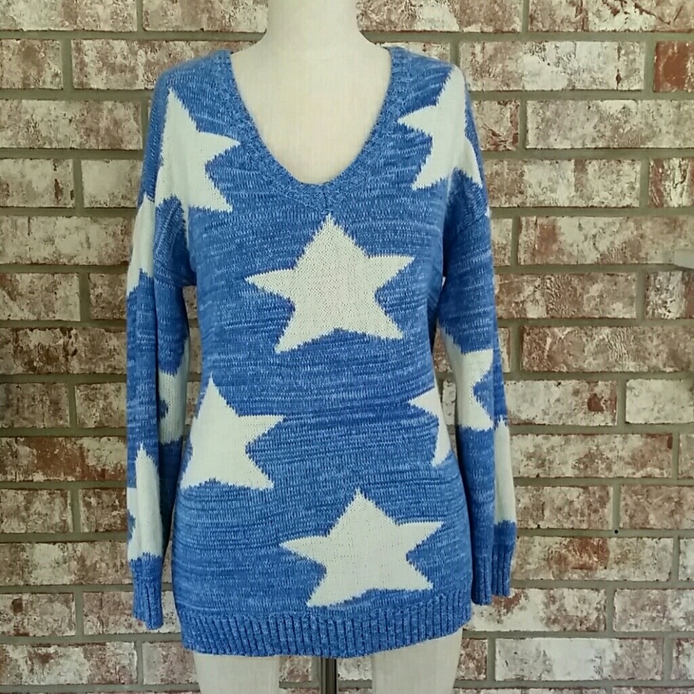 Blue v-neck sweater with white stars